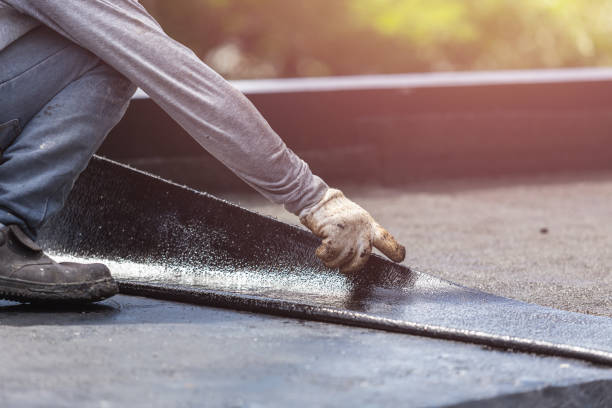 Professional Waterproofing technician working in Fayetteville, GA